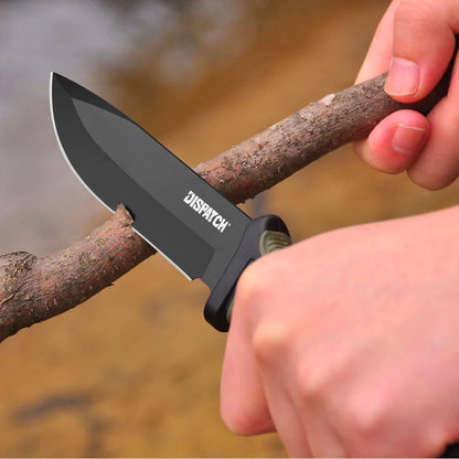 Tactical outdoor knife cutting through a branch near a body of water, showcasing precision and durability.